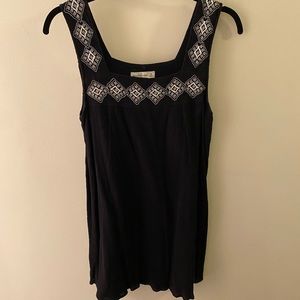 Little black dress with embroidered straps